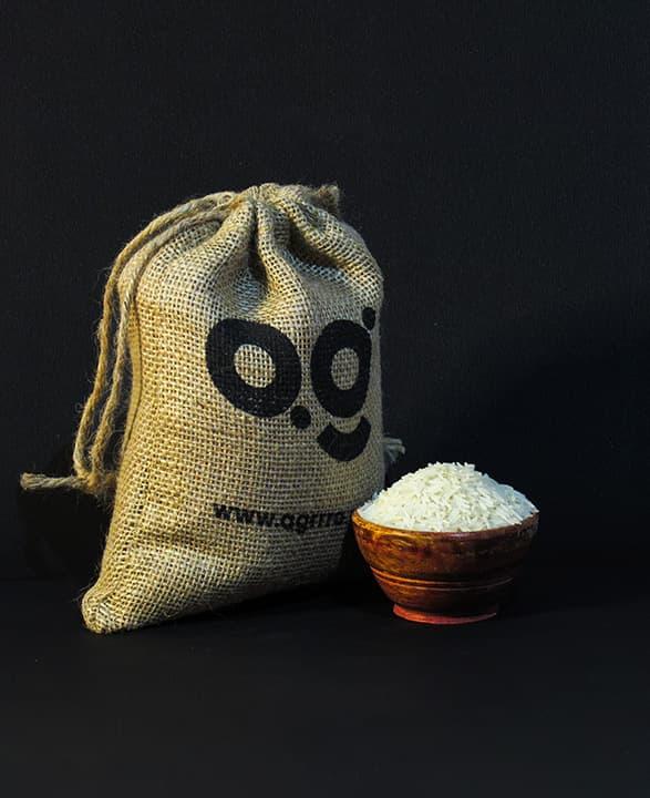 best organic basmati rice white, best organic white basmati rice, best organic rice, best organic basmati rice in a wooden bowl with eco friendly jute potli packaging filled with organic basmati rice. Order now from agrrro.