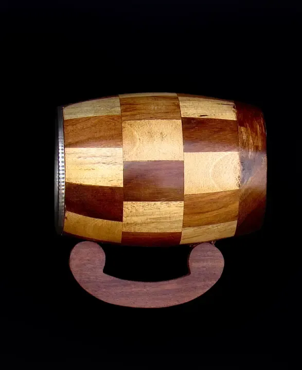 this is the beautiful and best handmade wooden coffee mug with stainless steel inside. It is handcrafted by the best artisans and engraved by hand. It has a checked design to make it beautiful and elegant. By the best handcrafted wooden coffee mug on www.agrrro.com.